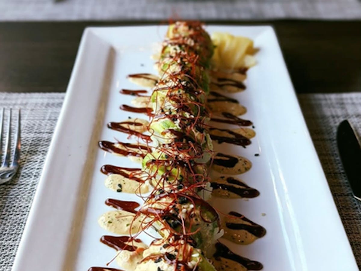 a plate of food with a knife